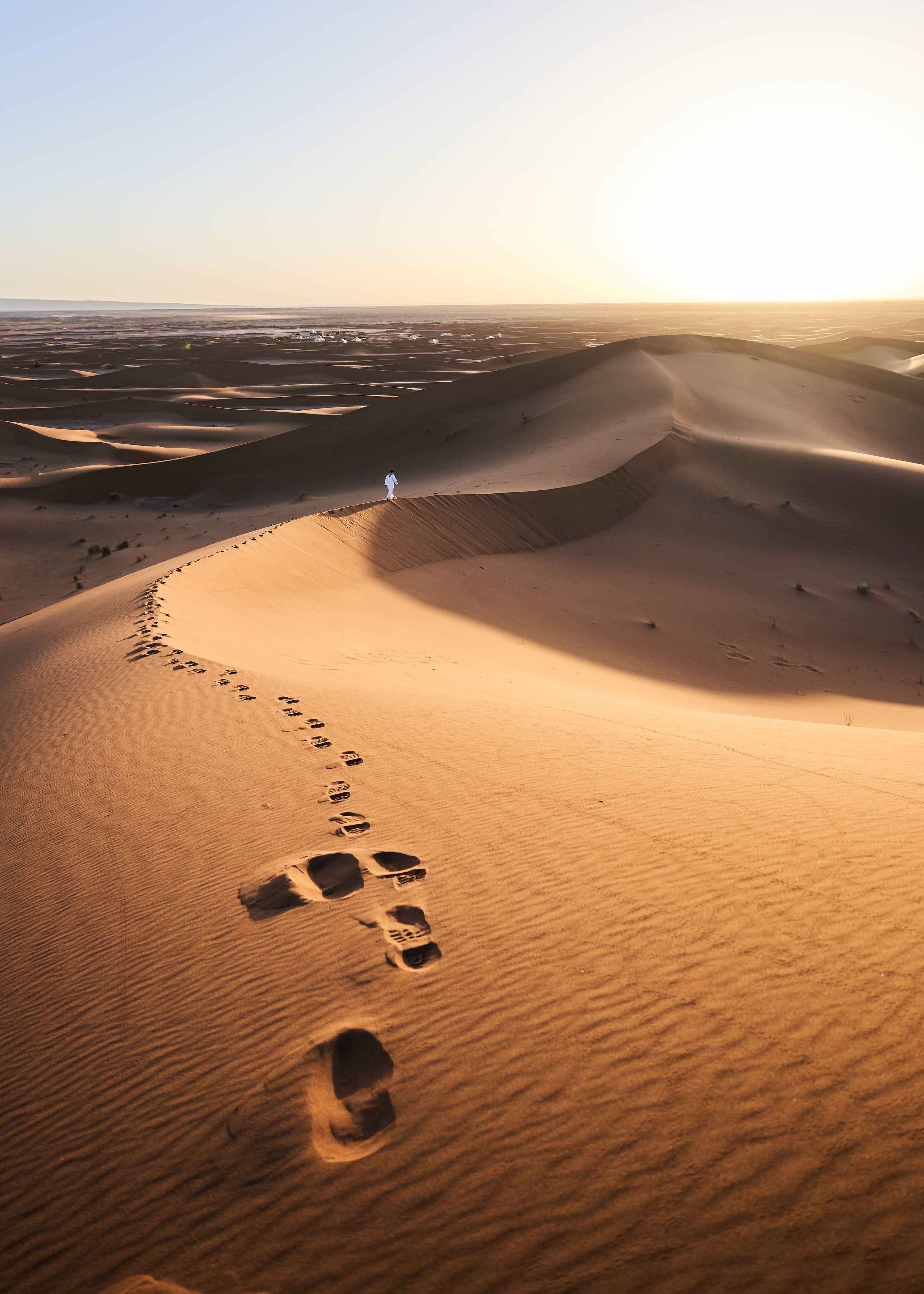 Desert with footprints in the sand