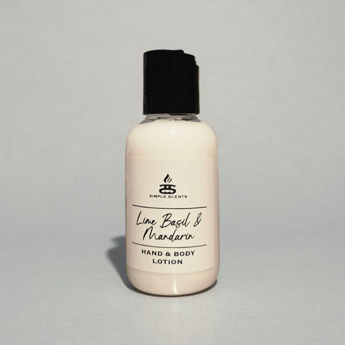 Simple Scents Minis Lime Basil & Mandarin Hand & Body Lotion 50ml - small white pump bottle with black flip cap and Simple Scents label, front view on light grey background
