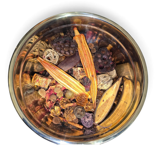 Rouge Hibiscus Boujee Potpourri in a silver bowl, featuring dried botanics with deep plum tones, lotus pods, wicker balls, seed pods and floral elements