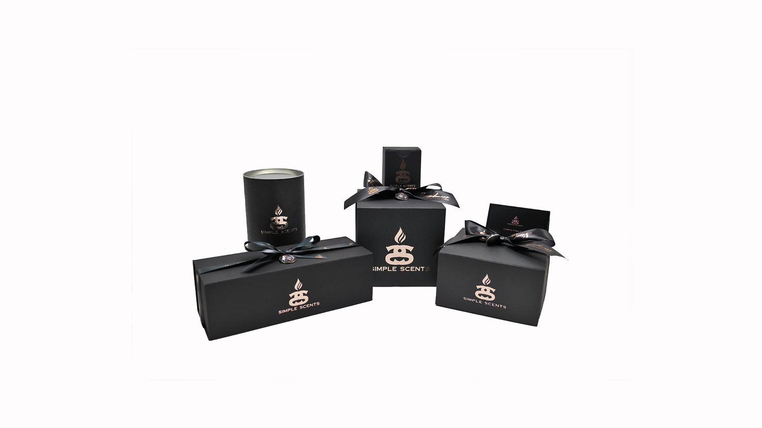 Simple Scents products in black and rose gold packaging