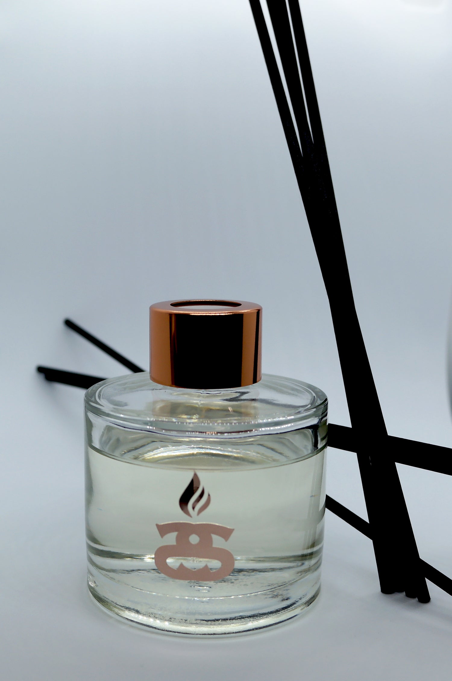 Simple Scents Excellence Reed Diffuser with black reeds placed at angles