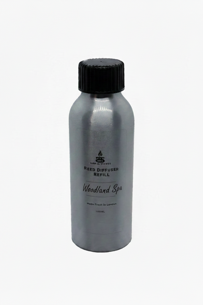 Woodland Spa Simple Scents Excellence Reed Diffuser Refill - 100ml silver aluminium bottle with black screw cap and Simple Scents logo, front view on white background