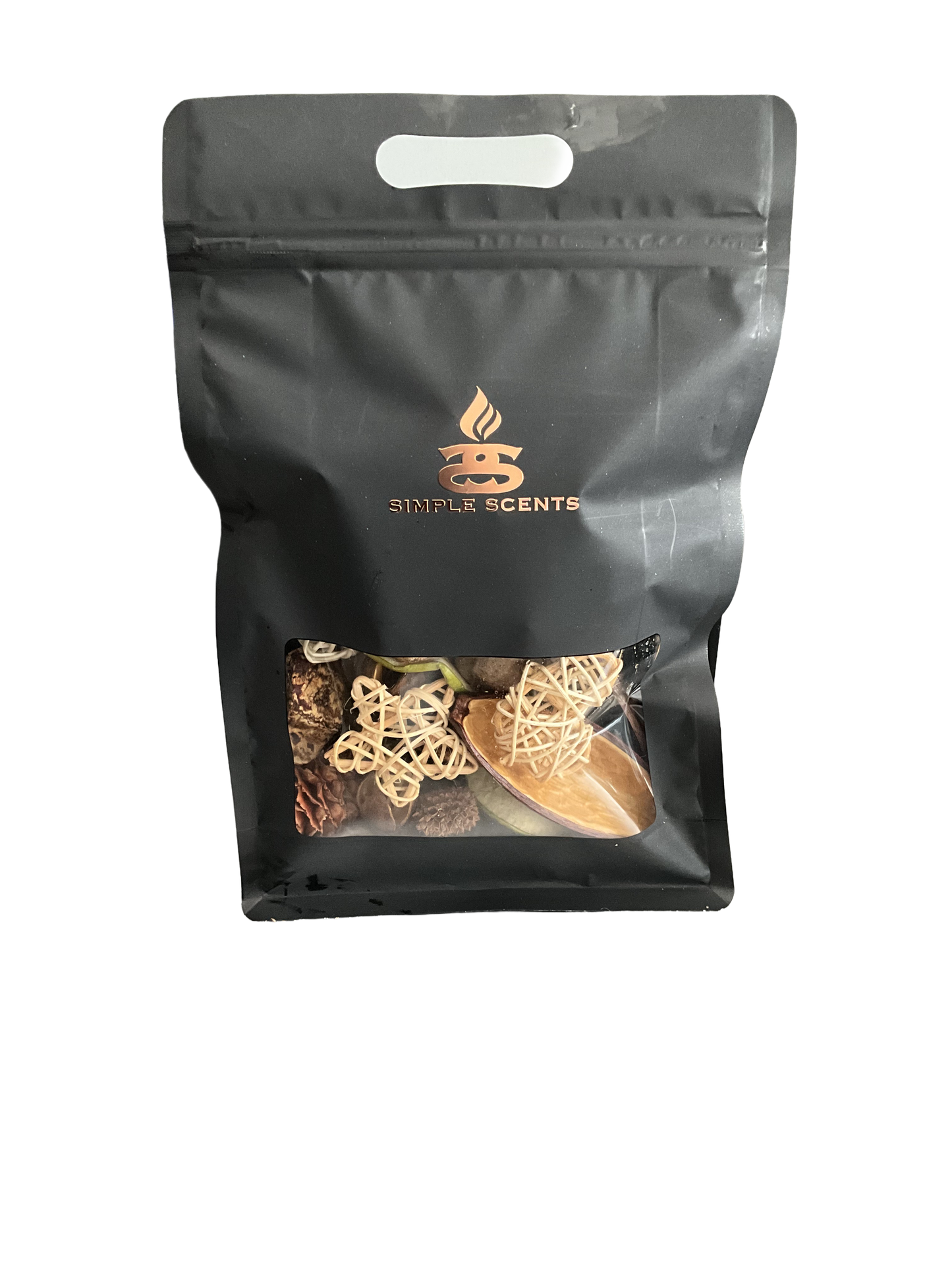 A black resealable stand-up pouch with a die-cut handle and a clear window near the bottom, showing dried botanicals and decorative wicker pieces inside. The pouch has a metallic rose-gold logo reading 'Simple Scents' on the front, set against a plain white background.