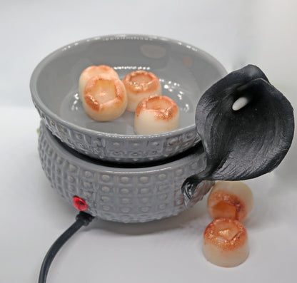 Grey dimpled ceramic candle and wax warmer with wax melts