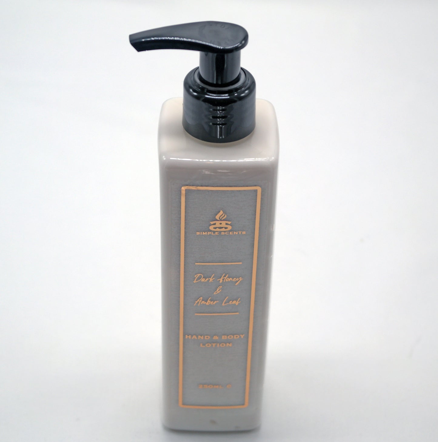 Dark Honey & Amber Leaf Hand Lotion in bottle